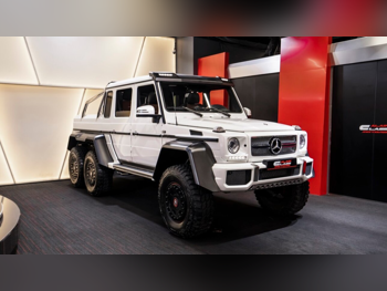 Mercedes-Benz  G-Class  63 AMG  2014  Automatic  213 Km  8 Cylinder  Four Wheel Drive (4WD)  SUV  White