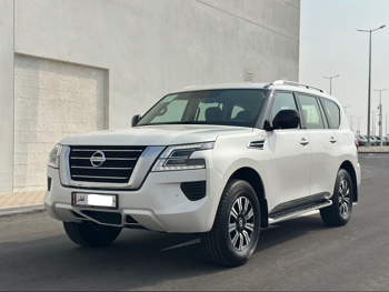 Nissan  Patrol  XE  2021  Automatic  117,000 Km  6 Cylinder  Four Wheel Drive (4WD)  SUV  White