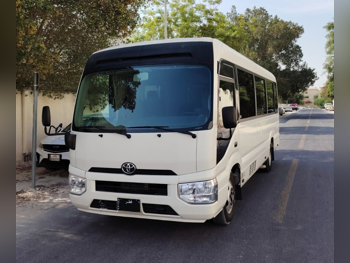 Toyota Coaster 2022 Manual 300,000 Km 4 Cylinder Rear Wheel Drive (RWD) Van / Bus White