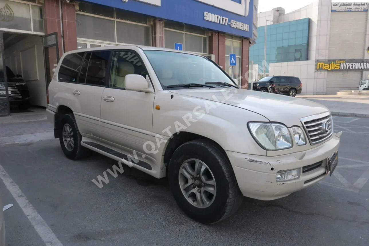 لكزس ال اكس 470 2006 اوتوماتيك 296,000 كم 8 سلندر دفع رباعي اس يو في أبيض لؤلؤي