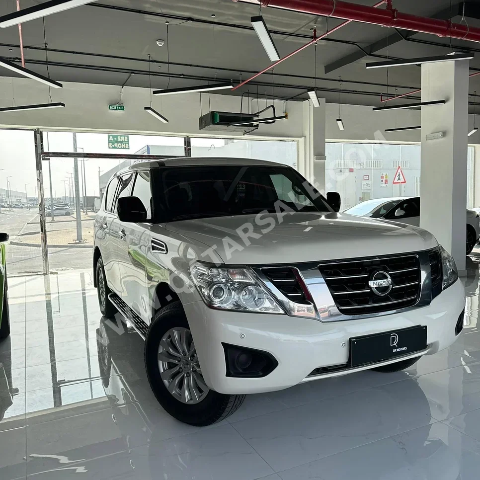 Nissan Patrol XE 2019 Automatic 194,000 Km 6 Cylinder Four Wheel Drive (4WD) SUV White