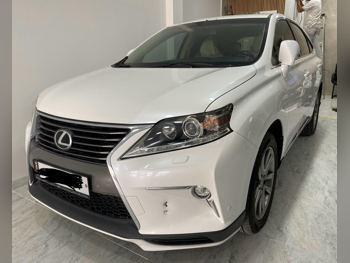 لكزس ار اكس 350 2015 اوتوماتيك 144,000 كم 6 سلندر دفع رباعي اس يو في أبيض