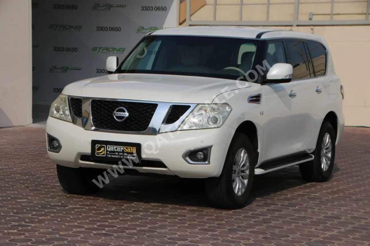 نيسان باترول اس اي 2016 اوتوماتيك 139,000 كم 8 سلندر دفع رباعي اس يو في أبيض