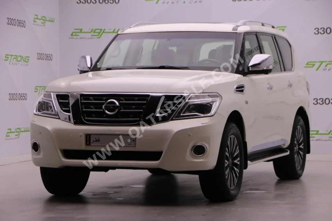 نيسان باترول بلاتنيوم 2014 اوتوماتيك 242,000 كم 8 سلندر دفع رباعي اس يو في أبيض