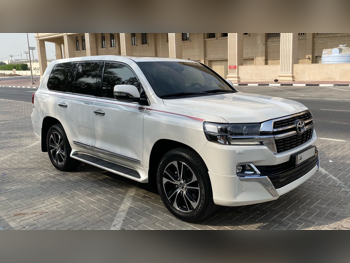 Toyota  Land Cruiser  GXR- Grand Touring  2021  Automatic  110,000 Km  8 Cylinder  Four Wheel Drive (4WD)  SUV  White