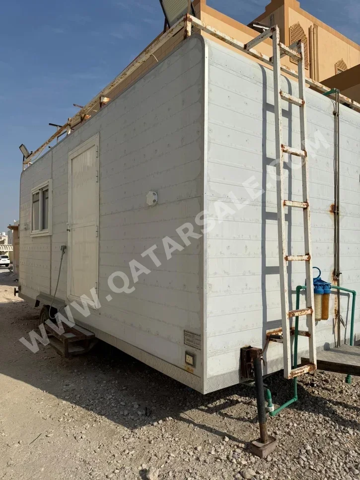 Caravan - 2022  - White  -Made in Qatar