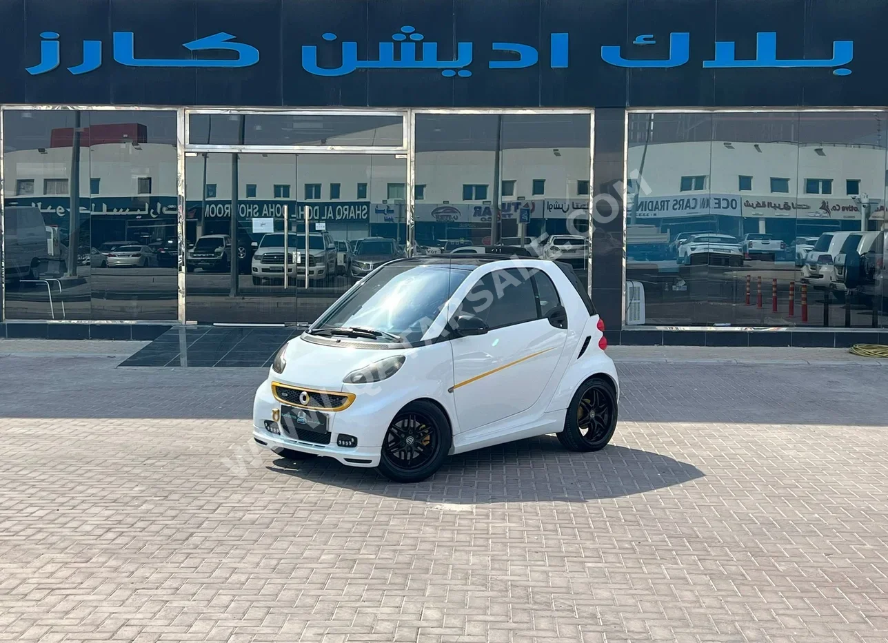 Smart  Brabus  2012  Manual  58,000 Km  4 Cylinder  Front Wheel Drive (FWD)  Hatchback  White