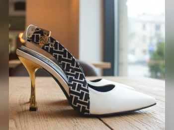 أحذية زارا جلد اصلي ذهب مقاس 39 ايطاليا نسائي