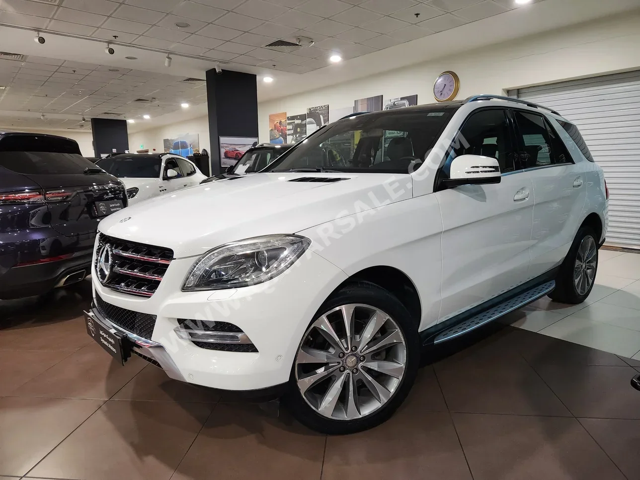 مرسيدس - بنز  ام ال  400  2015  اوتوماتيك  70,000 كم  6 سلندر  دفع رباعي  اس يو في  أبيض