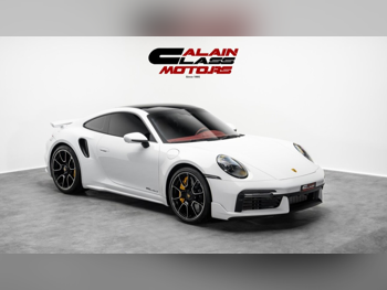 Porsche  911  Turbo S  2021  Automatic  21,798 Km  6 Cylinder  Rear Wheel Drive (RWD)  Coupe / Sport  White