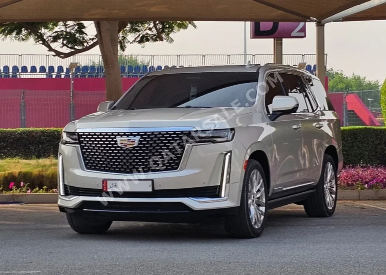 Cadillac  Escalade  Platinum  2022  Automatic  60,000 Km  8 Cylinder  Four Wheel Drive (4WD)  SUV  Beige