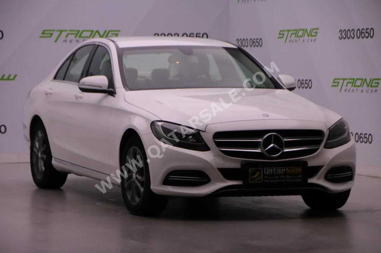 مرسيدس - بنز سي - كلاس 180 2015 عادي 129,000 كم 4 سلندر دفع خلفي سيدان أبيض