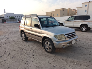 Mitsubishi  Pajero  2004  Automatic  260,000 Km  4 Cylinder  Four Wheel Drive (4WD)  SUV  Gray