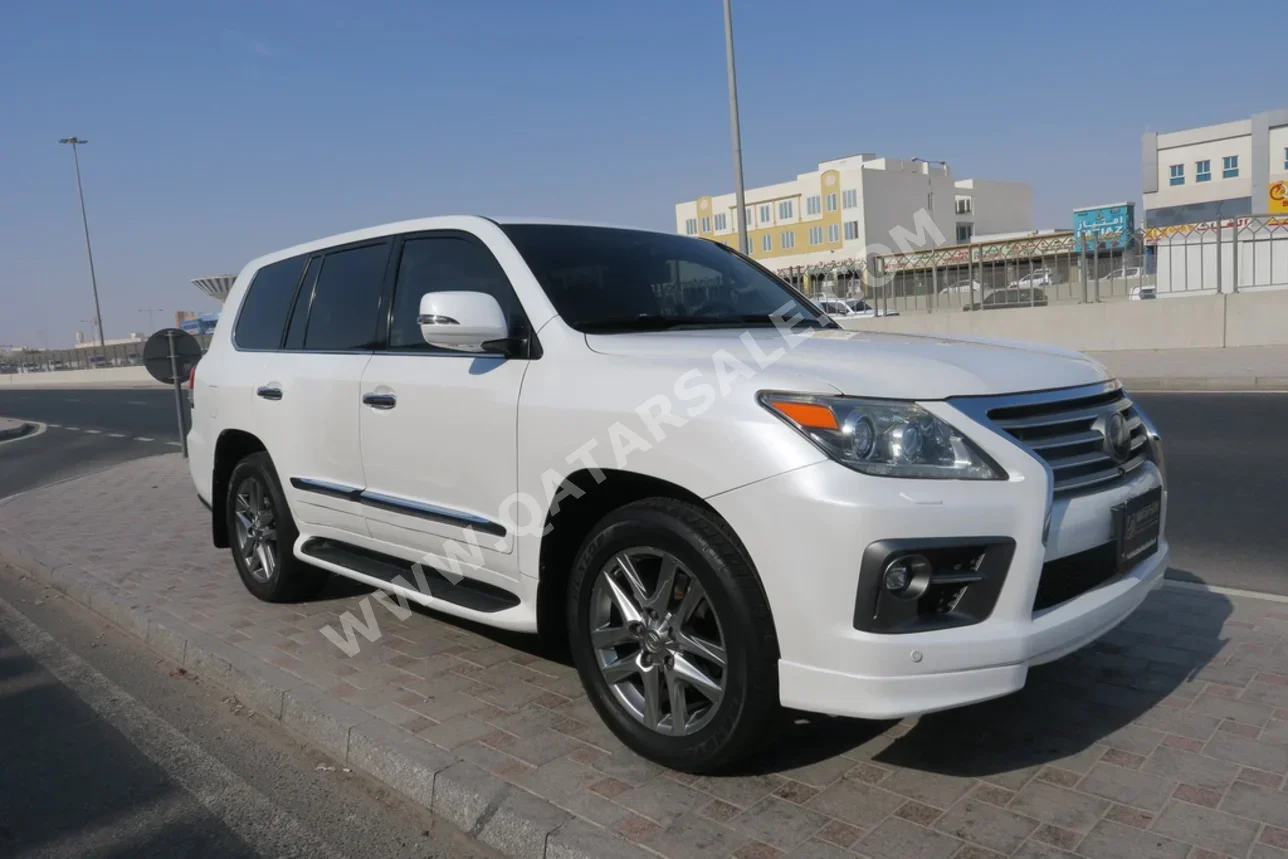 Lexus  LX  570  2013  Automatic  296,000 Km  8 Cylinder  Four Wheel Drive (4WD)  SUV  White and Black