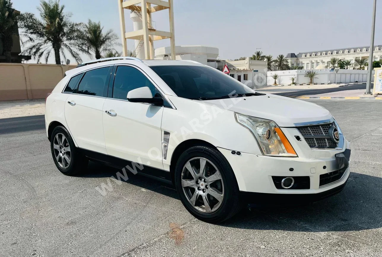 Cadillac  SRX  4  2010  Automatic  168,000 Km  6 Cylinder  Four Wheel Drive (4WD)  SUV  White