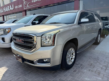 GMC  Yukon  XL  2015  Automatic  215,000 Km  8 Cylinder  Four Wheel Drive (4WD)  SUV  Gold