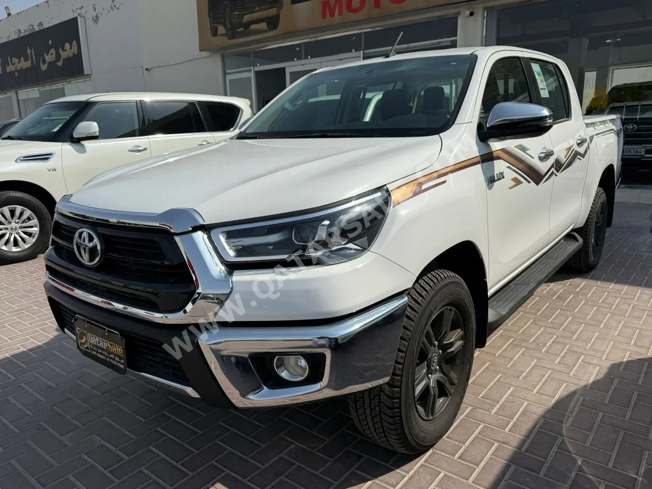 Toyota  Hilux  2024  Automatic  3,000 Km  4 Cylinder  Four Wheel Drive (4WD)  Pick Up  White  With Warranty