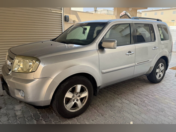 Honda  Pilot  2011  Automatic  230,000 Km  6 Cylinder  All Wheel Drive (AWD)  SUV  Blue & Silver