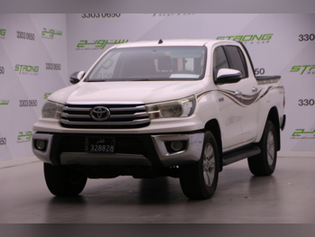 Toyota  Hilux  SR5  2019  Automatic  209,000 Km  4 Cylinder  Four Wheel Drive (4WD)  Pick Up  White