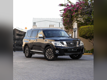 Nissan  Patrol  Platinum  2016  Automatic  198,000 Km  8 Cylinder  Four Wheel Drive (4WD)  SUV  Black  With Warranty