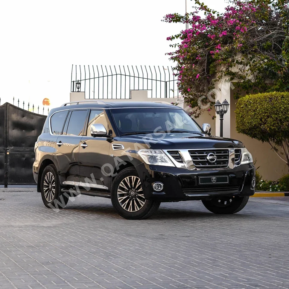 Nissan  Patrol  Platinum  2016  Automatic  198,000 Km  8 Cylinder  Four Wheel Drive (4WD)  SUV  Black  With Warranty