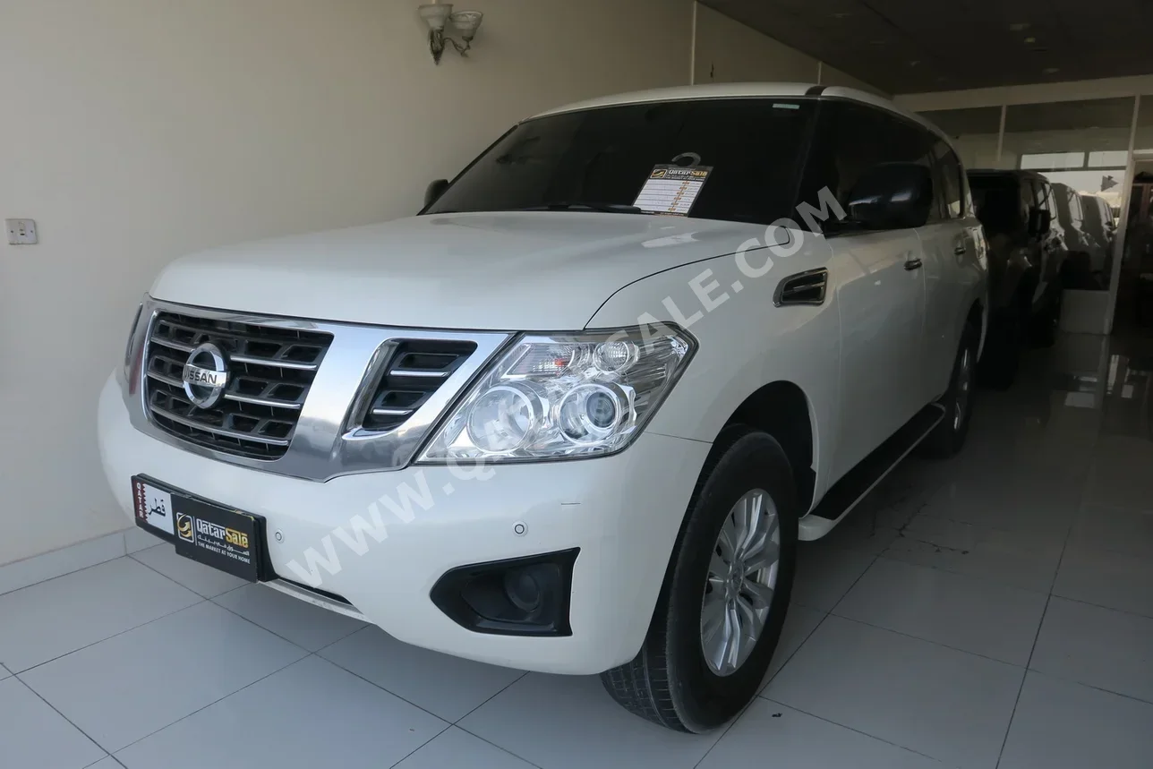 Nissan  Patrol  XE  2018  Automatic  183,000 Km  6 Cylinder  Four Wheel Drive (4WD)  SUV  White