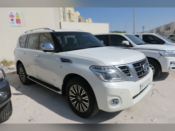 Nissan  Patrol  Platinum  2016  Automatic  366,000 Km  8 Cylinder  Four Wheel Drive (4WD)  SUV  White