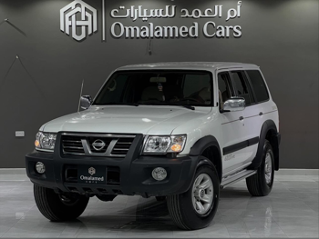 Nissan  Patrol  Safari  2001  Manual  241,000 Km  6 Cylinder  Four Wheel Drive (4WD)  SUV  White