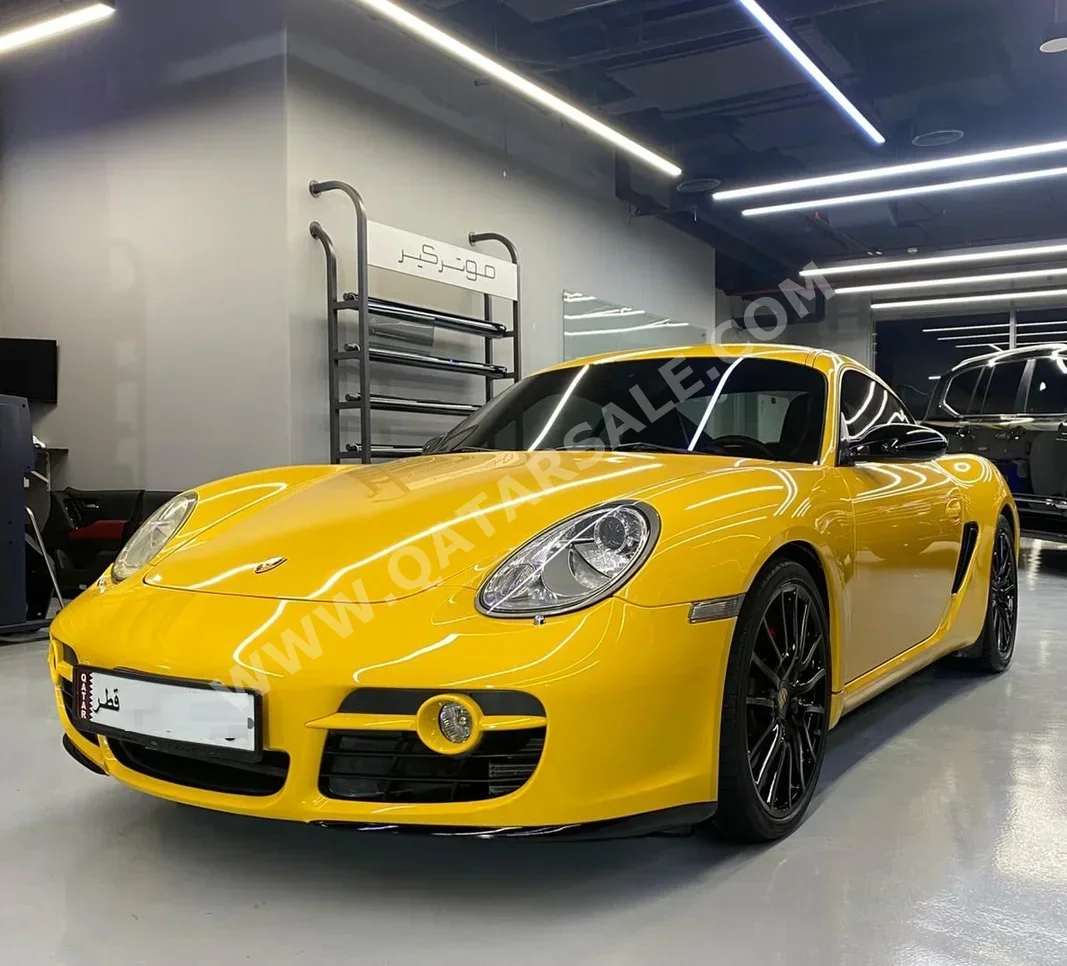 بورش كايمان اس 2008 اوتوماتيك 100,000 كم 6 سلندر دفع خلفي كوبيه \ سبورت أصفر