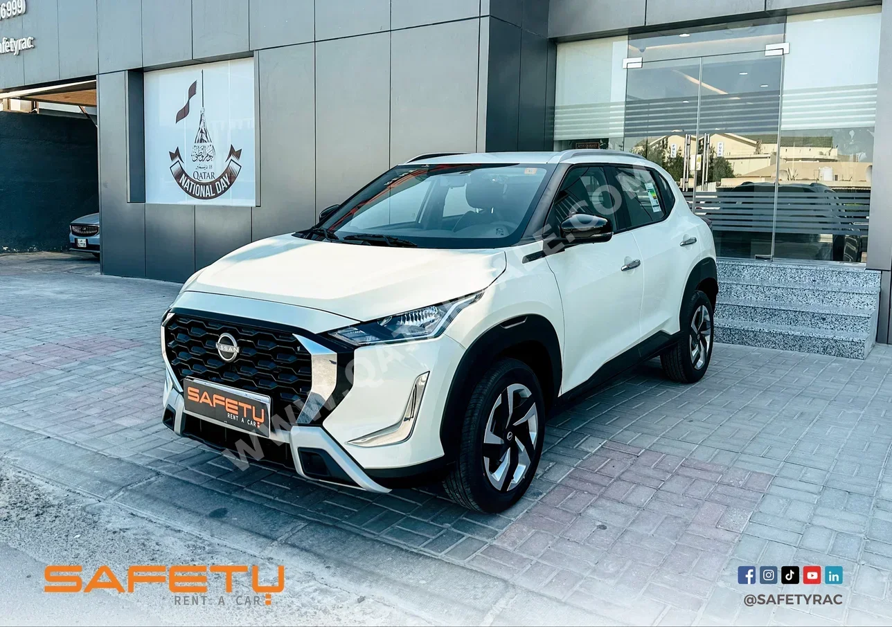 نيسان  ماجنيت  3 سلندر  إس يو في 2 في 4  أبيض  2025