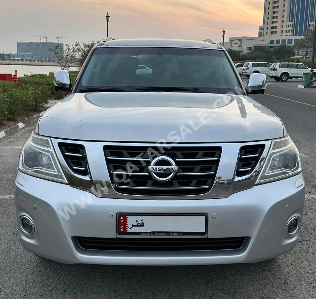 Nissan  Patrol  Platinum  2016  Automatic  185,500 Km  8 Cylinder  Four Wheel Drive (4WD)  SUV  Silver