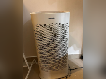 أجهزة تنقية الهواء وأجهزة العلاج - أبيض