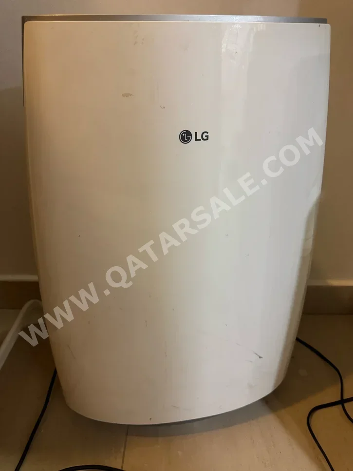 أجهزة تنقية الهواء وأجهزة العلاج - أبيض  - مع مرطب