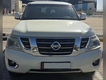 Nissan  Patrol  SE  2015  Automatic  175,000 Km  8 Cylinder  Four Wheel Drive (4WD)  SUV  White