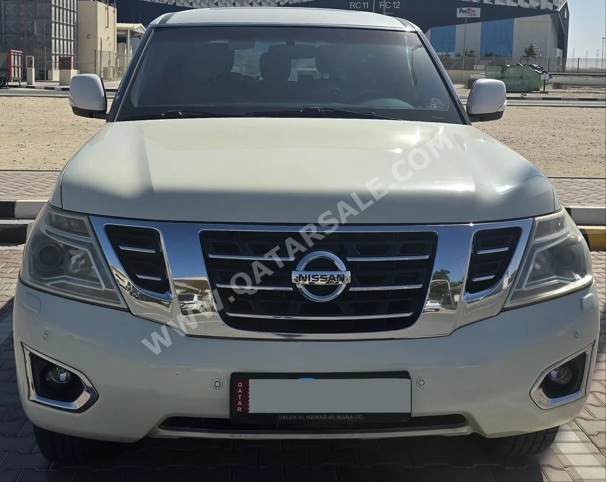 نيسان  باترول  اس اي  2015  اوتوماتيك  175,000 كم  8 سلندر  دفع رباعي  اس يو في  أبيض