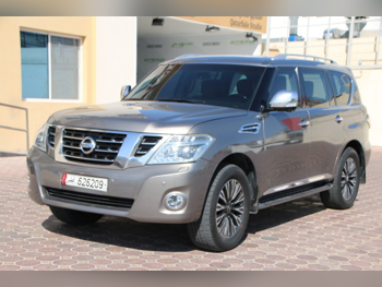 Nissan  Patrol  Platinum  2015  Automatic  146,000 Km  8 Cylinder  Four Wheel Drive (4WD)  SUV  Gold