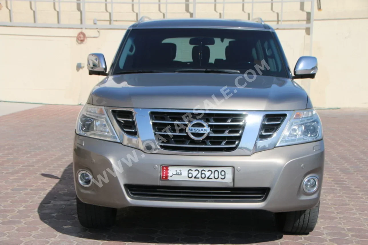 نيسان باترول بلاتنيوم 2015 اوتوماتيك 146,000 كم 8 سلندر دفع رباعي اس يو في ذهبي