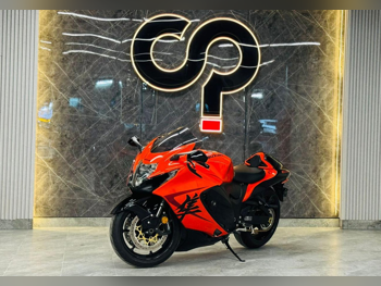 سوزوكي هايبوزا - 2024 - اللون برتقالي - الضمان