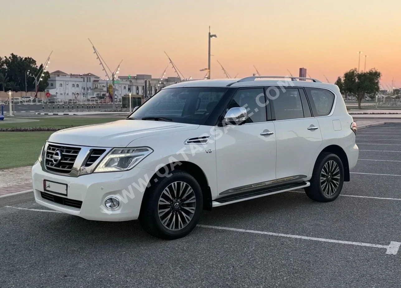 نيسان باترول بلاتنيوم 2015 اوتوماتيك 140,000 كم 8 سلندر دفع رباعي اس يو في أبيض