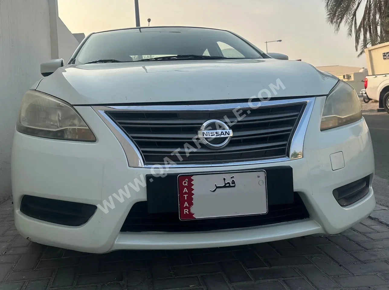 Nissan  Sentra  2015  Automatic  165,000 Km  4 Cylinder  Front Wheel Drive (FWD)  Sedan  White