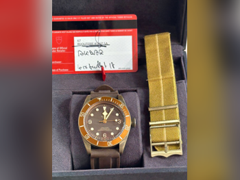 ساعات - تودور  - ساعات ميكانيكية  - بنى  - ساعات رجالي