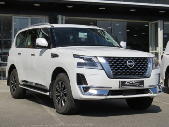 Nissan  Patrol  Titanium  2024  Automatic  110,000 Km  6 Cylinder  Four Wheel Drive (4WD)  SUV  White  With Warranty