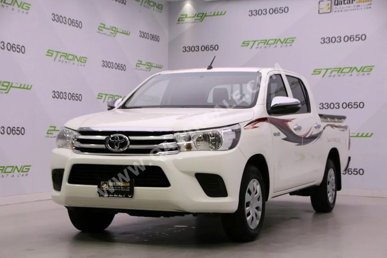 تويوتا هاي لوكس 2023 عادي 112,000 كم 4 سلندر دفع خلفي بيكب أبيض و أسود