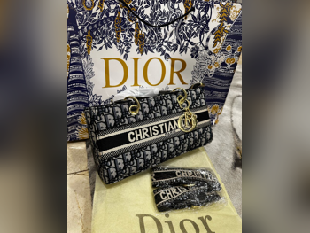 شنطة يد  - ديور  - أسود  - قماش قطني  - نسائي