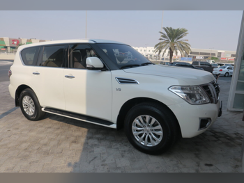 Nissan  Patrol  SE  2015  Automatic  216,000 Km  8 Cylinder  Four Wheel Drive (4WD)  SUV  White