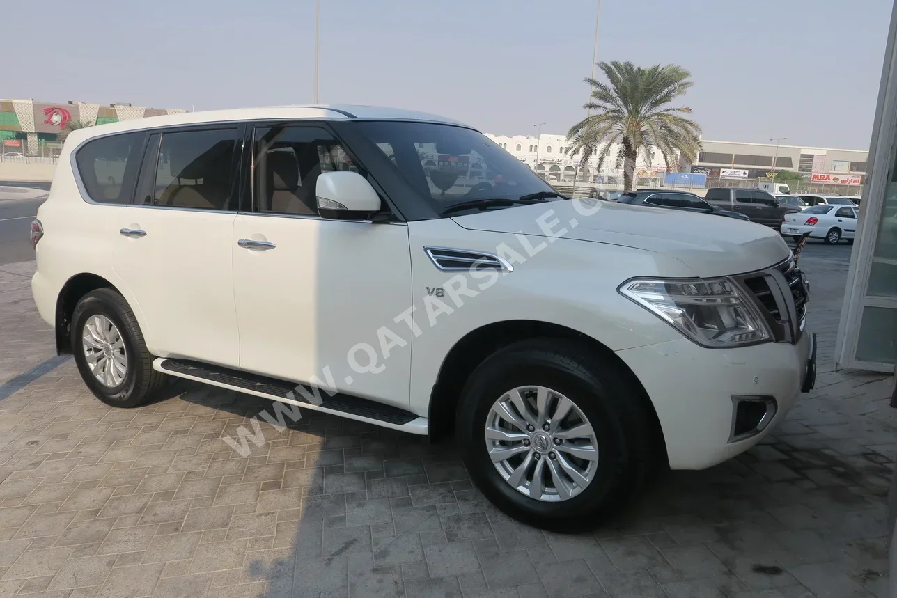 Nissan Patrol SE 2015 Automatic 216,000 Km 8 Cylinder Four Wheel Drive (4WD) SUV White