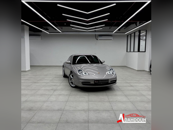 Porsche  911  Carrera  2002  Automatic  27,000 Km  6 Cylinder  Rear Wheel Drive (RWD)  Coupe / Sport  Gold