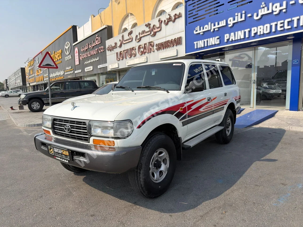 تويوتا لاند كروزر في اكس 1997 عادي 450,000 كم 6 سلندر دفع رباعي اس يو في أبيض