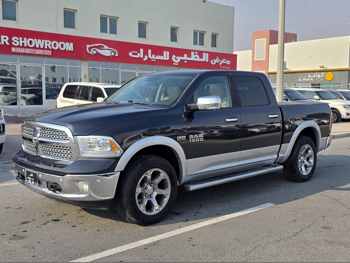 Dodge  Ram  1500  2014  Automatic  58,000 Km  8 Cylinder  Four Wheel Drive (4WD)  Pick Up  Gray
