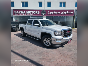GMC  Sierra  SLE  2017  Automatic  230,000 Km  8 Cylinder  Four Wheel Drive (4WD)  Pick Up  White